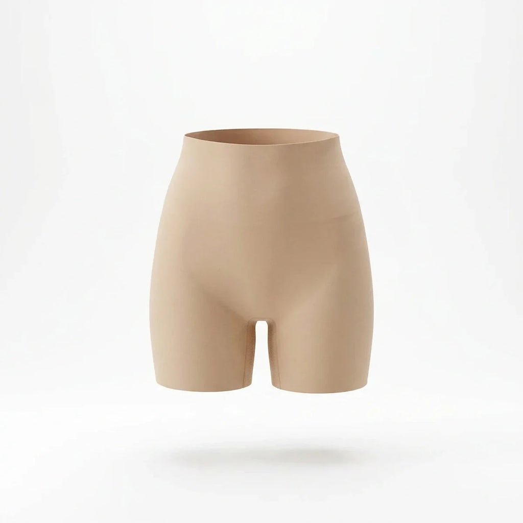 Panty gainant invisible femme — packshot produit, short mi-cuisse beige, finition seamless invisible